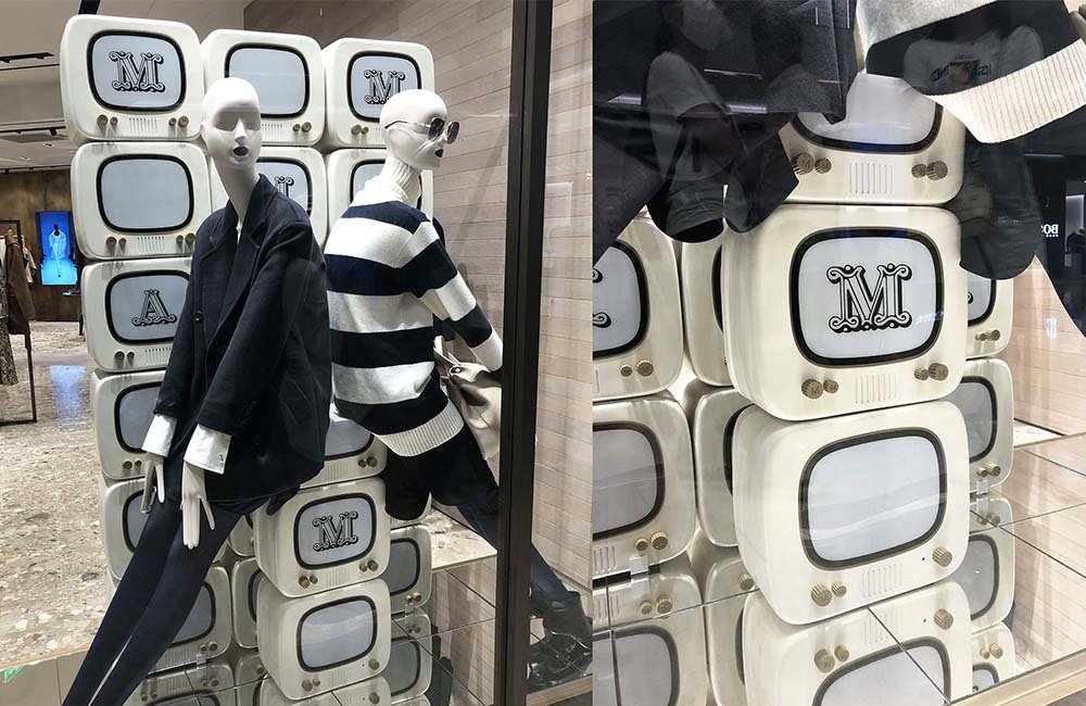MaxMara window design with wooden display props