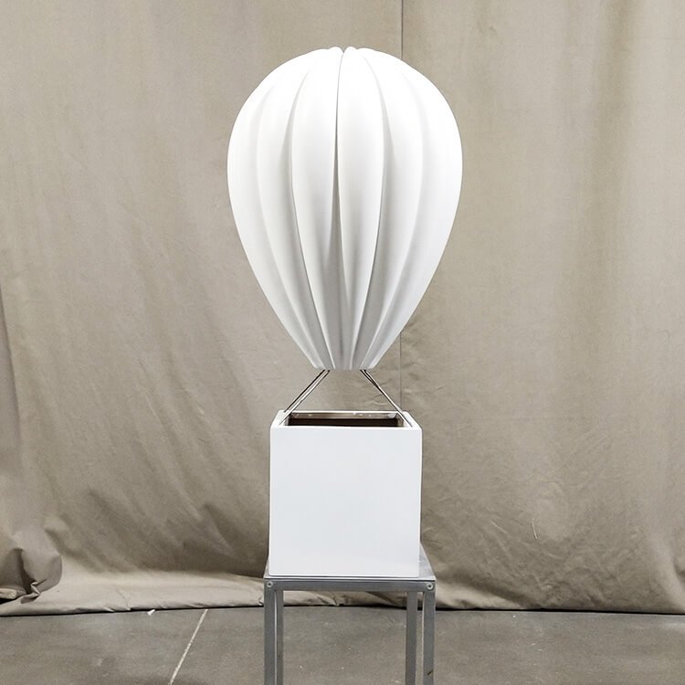 Standing fiberglass air balloon design with layer of primers coating